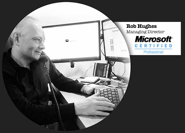 Rob Hughes, founder of Ayida IT Services, at his desk